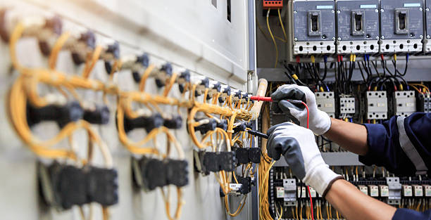 Professional Electrician technician working in Springs, NY